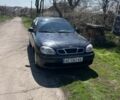 Черный Дэу Ланос, объемом двигателя 1.5 л и пробегом 324 тыс. км за 2599 $, фото 1 на Automoto.ua