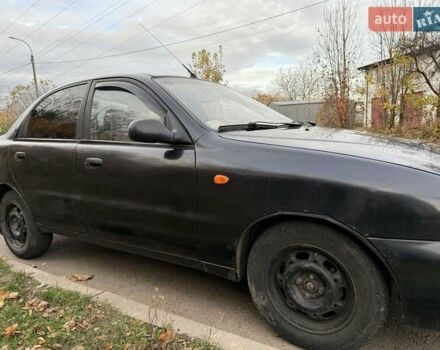 Черный Дэу Ланос, объемом двигателя 1.5 л и пробегом 100 тыс. км за 900 $, фото 13 на Automoto.ua