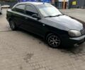 Черный Дэу Ланос, объемом двигателя 1.5 л и пробегом 0 тыс. км за 2000 $, фото 1 на Automoto.ua