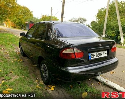 Черный Дэу Ланос, объемом двигателя 1.5 л и пробегом 256 тыс. км за 2600 $, фото 4 на Automoto.ua