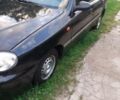 Черный Дэу Ланос, объемом двигателя 1.5 л и пробегом 100 тыс. км за 3000 $, фото 1 на Automoto.ua