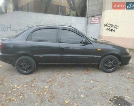 Черный Дэу Ланос, объемом двигателя 1.5 л и пробегом 200 тыс. км за 1550 $, фото 4 на Automoto.ua
