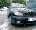 Черный Дэу Ланос, объемом двигателя 1.3 л и пробегом 400 тыс. км за 1300 $, фото 1 на Automoto.ua