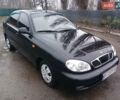 Черный Дэу Ланос, объемом двигателя 1.35 л и пробегом 122 тыс. км за 1699 $, фото 2 на Automoto.ua