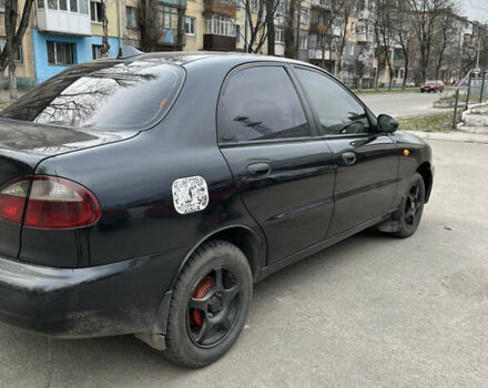 Черный Дэу Ланос, объемом двигателя 1.5 л и пробегом 222 тыс. км за 2400 $, фото 5 на Automoto.ua