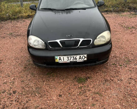 Черный Дэу Ланос, объемом двигателя 1.5 л и пробегом 296 тыс. км за 1000 $, фото 1 на Automoto.ua