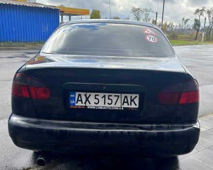 Деу Ланос 2006 у Харкові на Automoto.ua Чорний Деу Ланос, об'ємом двигуна 1.5 л та пробігом 213 тис. км за 1700 $, фото 3 на Automoto.ua