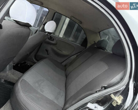 Черный Дэу Ланос, объемом двигателя 1.5 л и пробегом 251 тыс. км за 2550 $, фото 9 на Automoto.ua