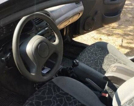 Чорний Деу Ланос, об'ємом двигуна 1.5 л та пробігом 169 тис. км за 1700 $, фото 10 на Automoto.ua