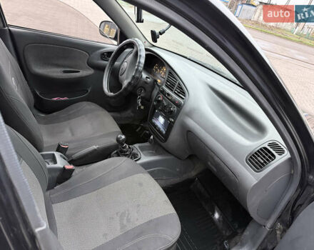 Черный Дэу Ланос, объемом двигателя 1.5 л и пробегом 251 тыс. км за 2550 $, фото 5 на Automoto.ua