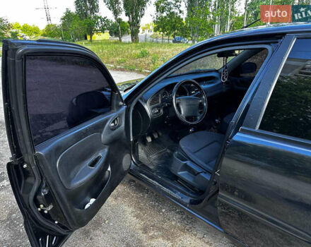 Черный Дэу Ланос, объемом двигателя 1.5 л и пробегом 220 тыс. км за 3100 $, фото 15 на Automoto.ua
