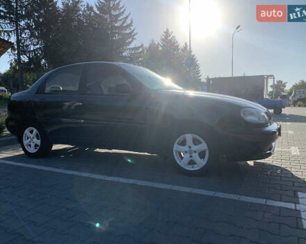 Чорний Деу Ланос, об'ємом двигуна 1.5 л та пробігом 329 тис. км за 2000 $, фото 4 на Automoto.ua