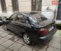 Черный Дэу Ланос, объемом двигателя 1.5 л и пробегом 256 тыс. км за 2198 $, фото 1 на Automoto.ua