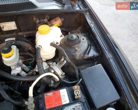 Черный Дэу Ланос, объемом двигателя 1.5 л и пробегом 231 тыс. км за 1999 $, фото 13 на Automoto.ua