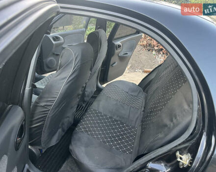 Черный Дэу Ланос, объемом двигателя 1.5 л и пробегом 160 тыс. км за 2800 $, фото 11 на Automoto.ua