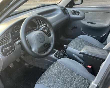 Дэу Ланос 2006 в Львове на Automoto.ua Черный Дэу Ланос, объемом двигателя 1.5 л и пробегом 188 тыс. км за 2000 $, фото 4 на Automoto.ua