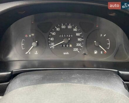 Черный Дэу Ланос, объемом двигателя 0 л и пробегом 201 тыс. км за 1500 $, фото 3 на Automoto.ua