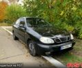 Черный Дэу Ланос, объемом двигателя 1.5 л и пробегом 256 тыс. км за 2600 $, фото 1 на Automoto.ua