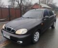 Черный Дэу Ланос, объемом двигателя 1.5 л и пробегом 200 тыс. км за 2150 $, фото 1 на Automoto.ua