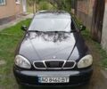 Черный Дэу Ланос, объемом двигателя 1.5 л и пробегом 272 тыс. км за 2000 $, фото 1 на Automoto.ua