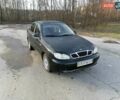 Черный Дэу Ланос, объемом двигателя 1.5 л и пробегом 300 тыс. км за 1650 $, фото 1 на Automoto.ua