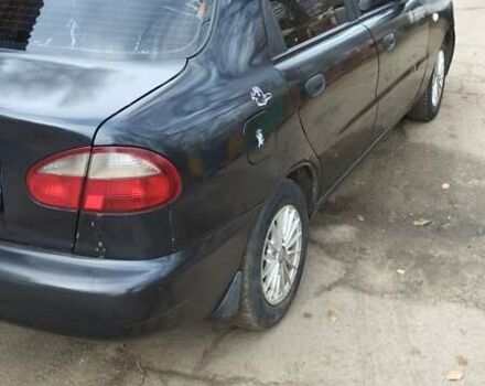 Черный Дэу Ланос, объемом двигателя 1.5 л и пробегом 244 тыс. км за 1650 $, фото 4 на Automoto.ua