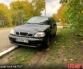 Черный Дэу Ланос, объемом двигателя 1.5 л и пробегом 256 тыс. км за 2600 $, фото 1 на Automoto.ua