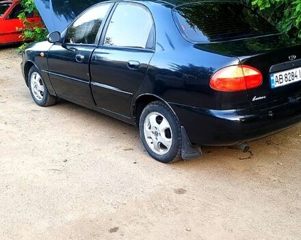 Черный Дэу Ланос, объемом двигателя 1.5 л и пробегом 230 тыс. км за 1000 $, фото 1 на Automoto.ua