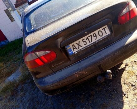 Черный Дэу Ланос, объемом двигателя 1.6 л и пробегом 380 тыс. км за 2300 $, фото 3 на Automoto.ua