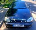 Чорний Деу Ланос, об'ємом двигуна 1.5 л та пробігом 230 тис. км за 1600 $, фото 1 на Automoto.ua