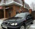 Чорний Деу Ланос, об'ємом двигуна 1.5 л та пробігом 174 тис. км за 2950 $, фото 1 на Automoto.ua