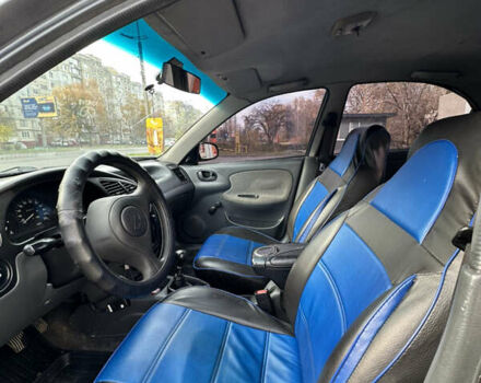 Чорний Деу Ланос, об'ємом двигуна 1.5 л та пробігом 181 тис. км за 1888 $, фото 8 на Automoto.ua