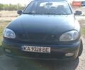 Черный Дэу Ланос, объемом двигателя 1.6 л и пробегом 271 тыс. км за 2000 $, фото 3 на Automoto.ua