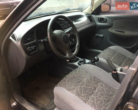 Чорний Деу Ланос, об'ємом двигуна 1.39 л та пробігом 200 тис. км за 900 $, фото 2 на Automoto.ua