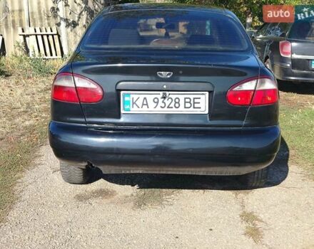 Черный Дэу Ланос, объемом двигателя 1.6 л и пробегом 271 тыс. км за 2000 $, фото 7 на Automoto.ua