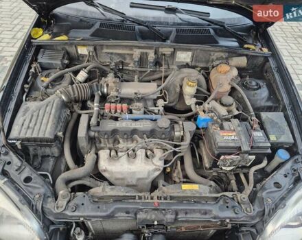 Деу Ланос 2007 у Новомосковске на Automoto.ua Чорний Деу Ланос, об'ємом двигуна 1.5 л та пробігом 252 тис. км за 2500 $, фото 20 на Automoto.ua