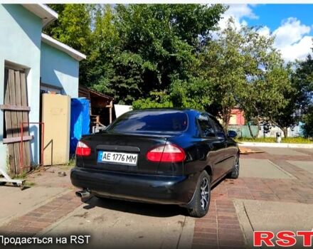 Чорний Деу Ланос, об'ємом двигуна 1.4 л та пробігом 222 тис. км за 2100 $, фото 2 на Automoto.ua