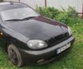 Черный Дэу Ланос, объемом двигателя 1.5 л и пробегом 248 тыс. км за 1600 $, фото 1 на Automoto.ua