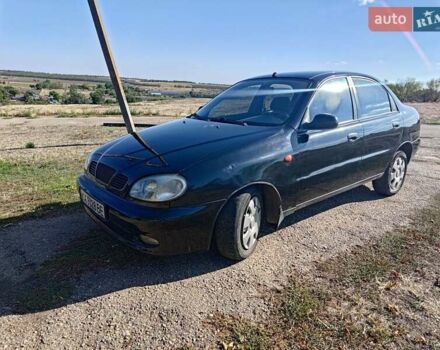 Черный Дэу Ланос, объемом двигателя 1.6 л и пробегом 271 тыс. км за 2000 $, фото 9 на Automoto.ua