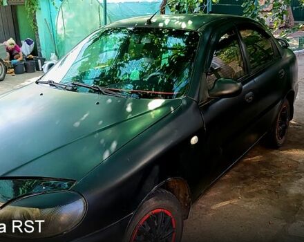 Чорний Деу Ланос, об'ємом двигуна 1.5 л та пробігом 236 тис. км за 3000 $, фото 3 на Automoto.ua