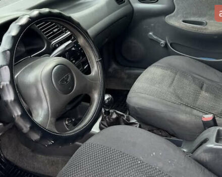 Черный Дэу Ланос, объемом двигателя 1.5 л и пробегом 233 тыс. км за 2200 $, фото 7 на Automoto.ua