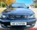 Черный Дэу Ланос, объемом двигателя 1.5 л и пробегом 233 тыс. км за 2650 $, фото 1 на Automoto.ua