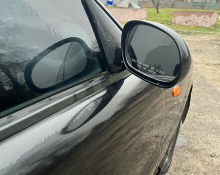 Черный Дэу Ланос, объемом двигателя 1.5 л и пробегом 201 тыс. км за 1000 $, фото 4 на Automoto.ua