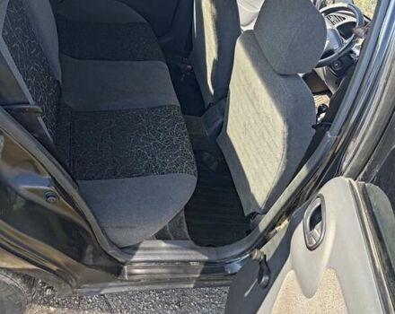 Черный Дэу Ланос, объемом двигателя 1.6 л и пробегом 271 тыс. км за 2000 $, фото 11 на Automoto.ua