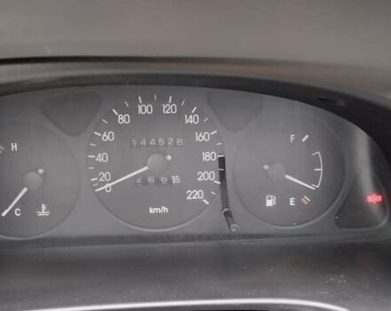 Черный Дэу Ланос, объемом двигателя 1.5 л и пробегом 145 тыс. км за 1200 $, фото 6 на Automoto.ua