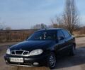 Черный Дэу Ланос, объемом двигателя 1.6 л и пробегом 200 тыс. км за 1499 $, фото 1 на Automoto.ua