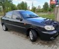 Чорний Деу Ланос, об'ємом двигуна 1.5 л та пробігом 155 тис. км за 1750 $, фото 1 на Automoto.ua
