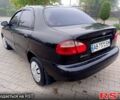 Чорний Деу Ланос, об'ємом двигуна 1.5 л та пробігом 0 тис. км за 2300 $, фото 3 на Automoto.ua