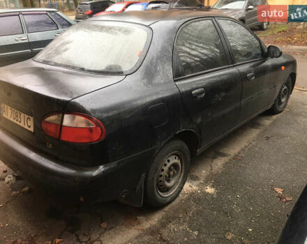 Чорний Деу Ланос, об'ємом двигуна 1.39 л та пробігом 200 тис. км за 900 $, фото 5 на Automoto.ua