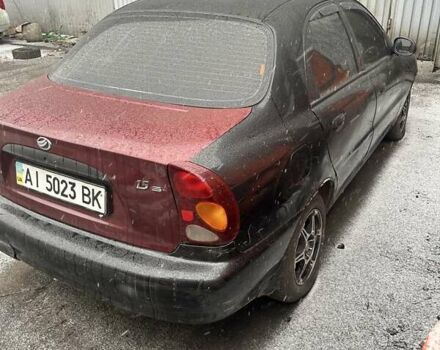 Черный Дэу Ланос, объемом двигателя 1.5 л и пробегом 256 тыс. км за 1400 $, фото 3 на Automoto.ua